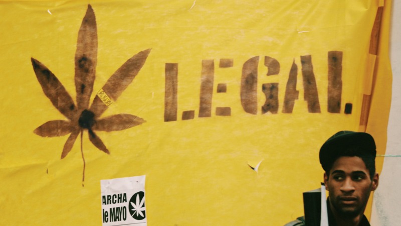 image of a guy with legalize weed graffiti