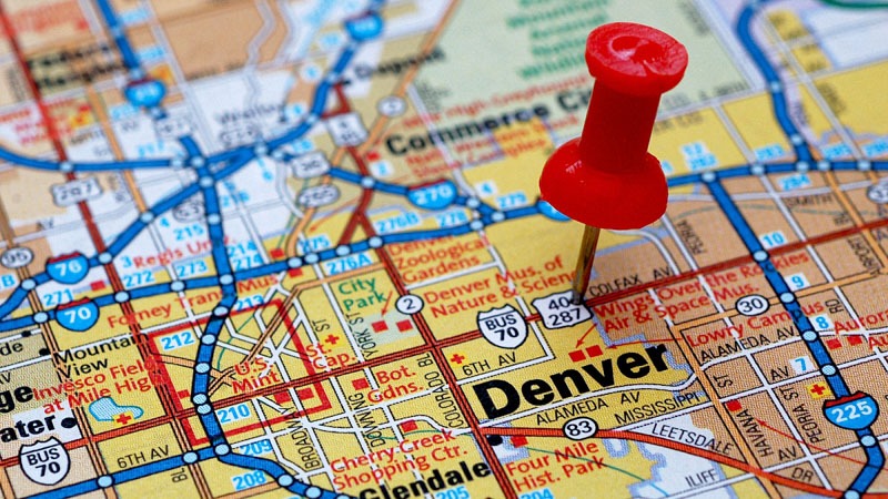 denver on a map with a red pin on it