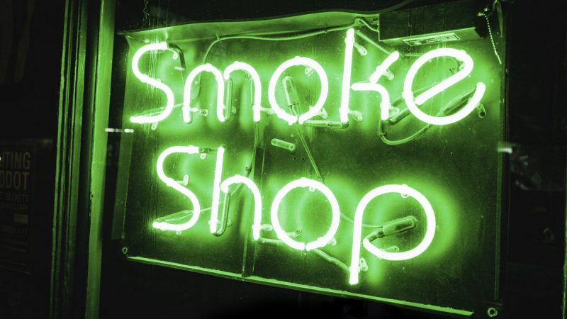 Vt medical cannabis dispensary shop sign in green neon light