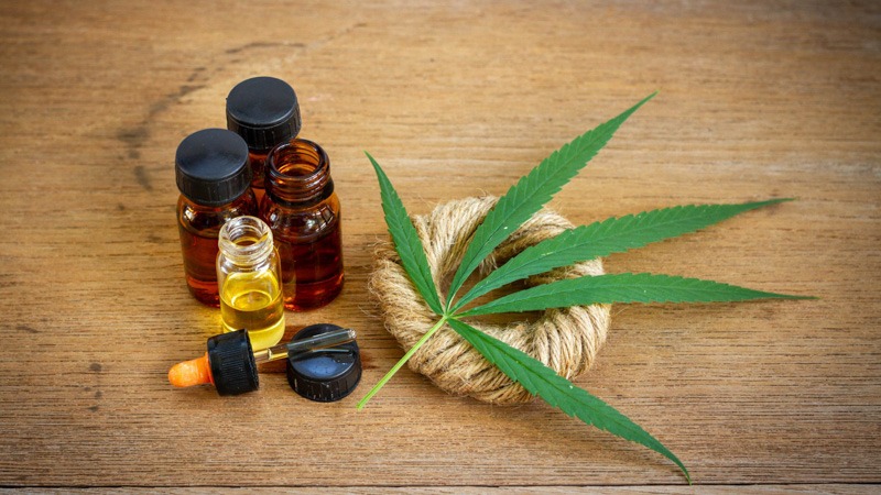 cbd products on a wooden table