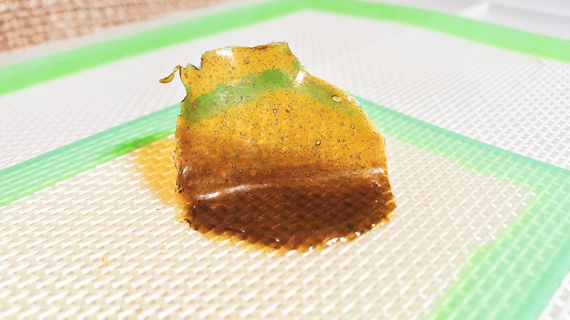 Live CBD Rosin on a backing sheet