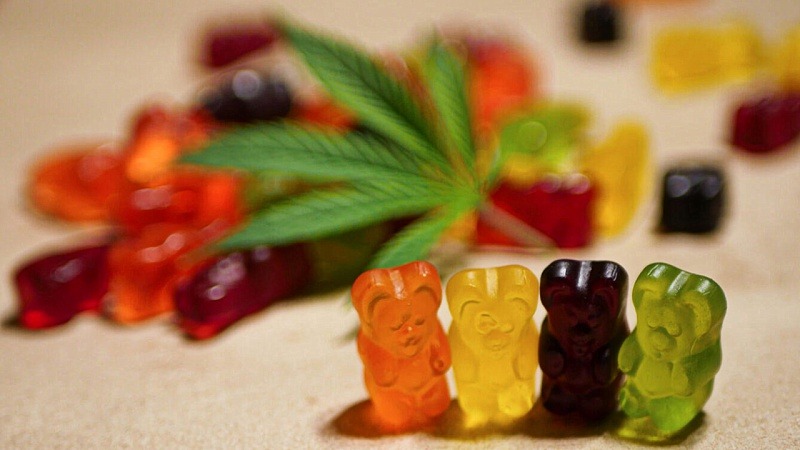 Colorful CBD Gummies with cannabis leaf